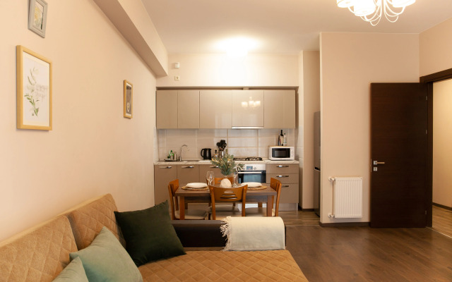 V Komplekse s Chastnoy Parkovkoy Apartments