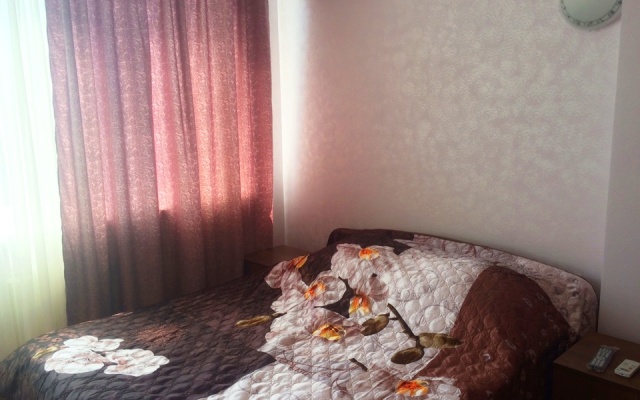 V Tsentre Goroda Apartments