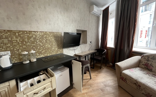 V Tsentre Goroda Flat