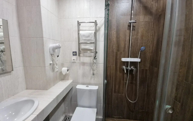 V Tsentre Goroda Apartments