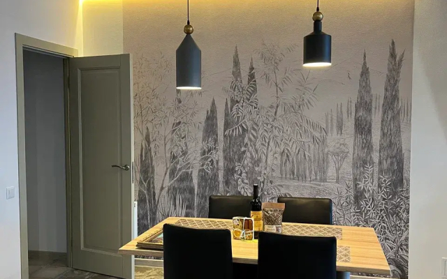 Апартаменты Легенда с зоной патио и отдельной спальней