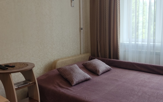 V Tsentre Dzerzhinskogo Rayona Flat
