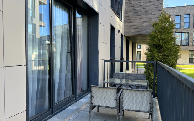 S Kaminom Lukomorye v Okhta Parke Apartments