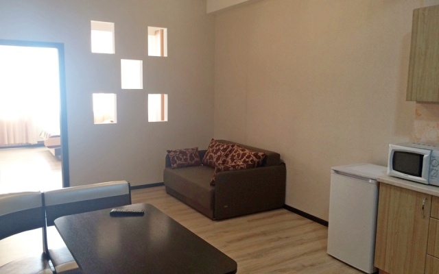 V Tsentre Goroda Apartments