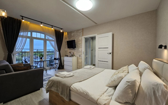 Квартира лофт над елями