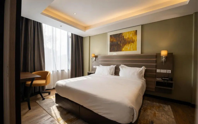 Отель Trademark Suites at Enaki Town