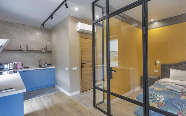 V Tsentre Goroda Apartments