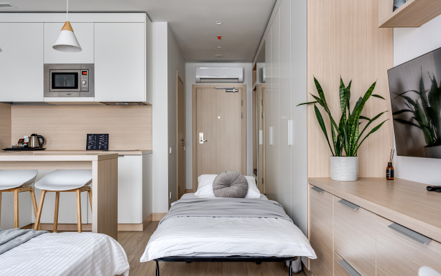 Grey Apartment with a view of the city Apartments