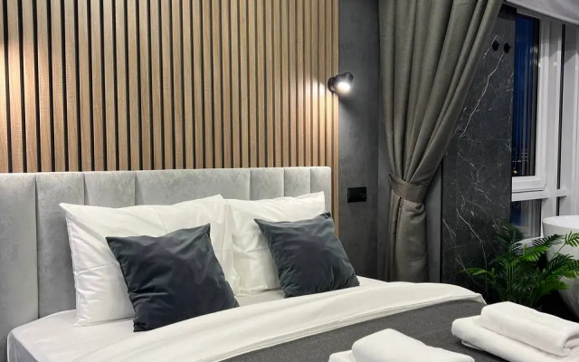 Апартаменты с панорамным видом на город и ванной