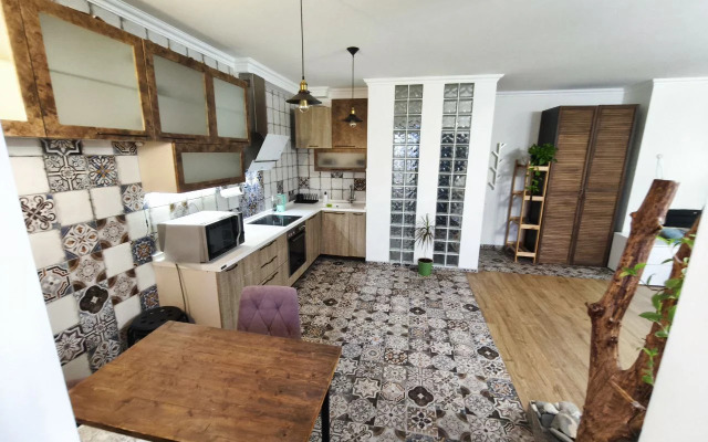 Апартаменты Студия с камином, деревом и видом на реку