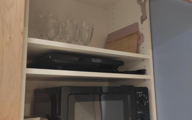 V Tsentre Goroda Apartments