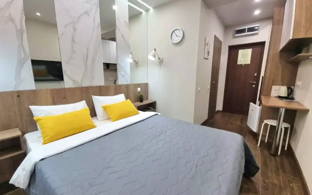 V Tsentre Goroda Apartments