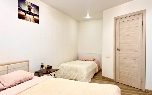 Уютные Апартаменты в доме у Космопорта (ул. Дыбенко 27а)