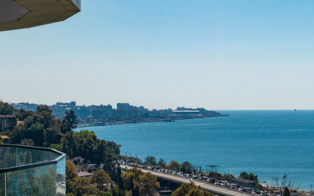 V Sochi Tsentr  Khosty s kruglogodichnym podogrevaemym bassejnom i vidom na more AK Gorka Apartments