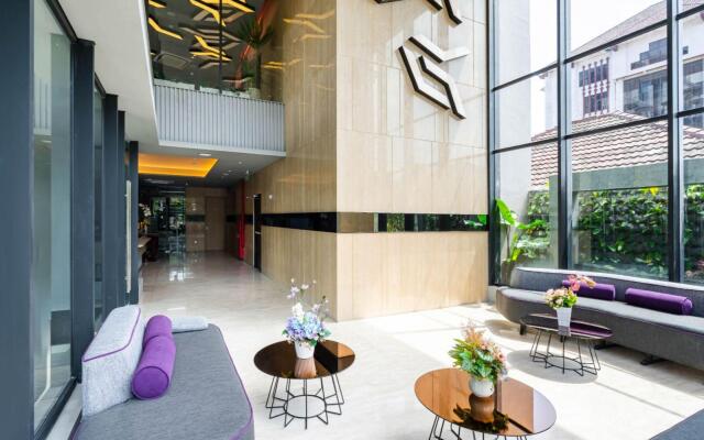 Отель Quest Hotel Prime Pemuda