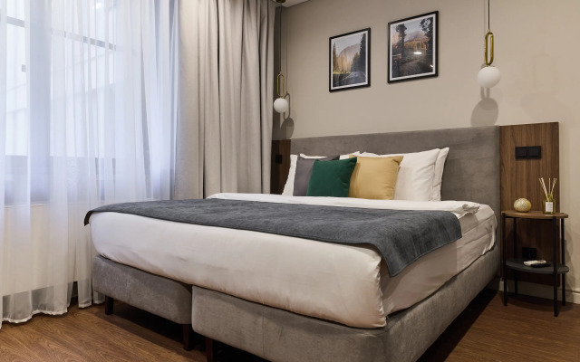 Апартаменты С.Утками у Невского проспекта | Современная студия Бонд в апарт-отеле VIDI