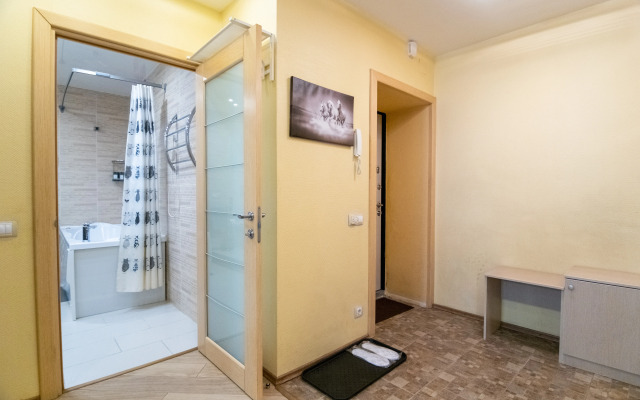 V Tikhom Ukhozhennom Rayone Apartments