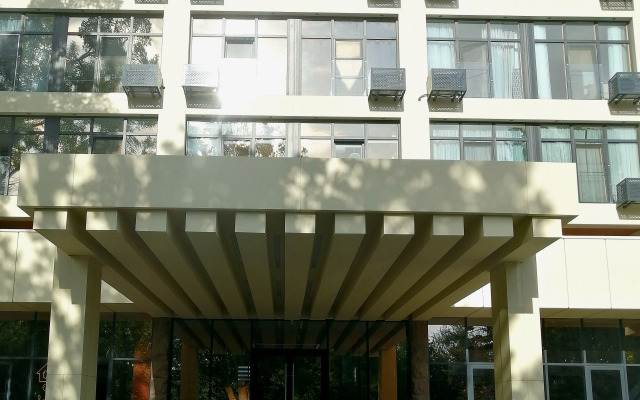 V Tsentre Goroda Apartments