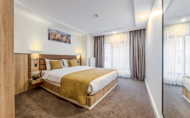 Отель Roys Hotel & Suites