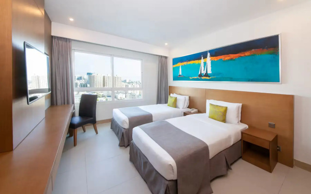 Отель Ramada By Wyndham Beach Ajman