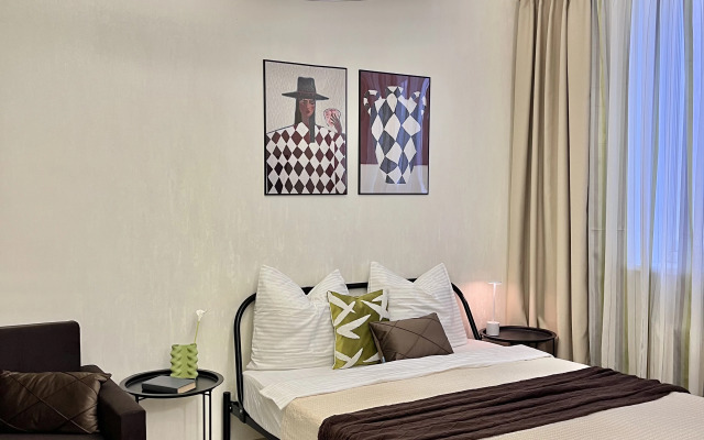 Квартира Свeтлaя Студия в Центрe Гopoдa