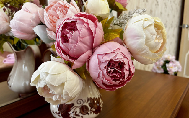 Апартаменты Уютная двухкомнатная квартира в центре города