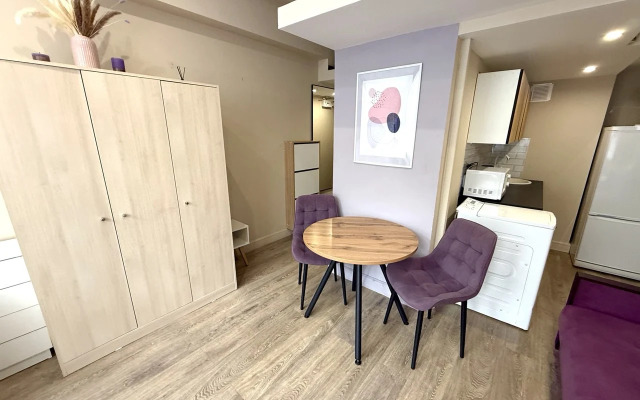 Квартира Уютная студия в современном апарт-комплексе с собственной парковкой