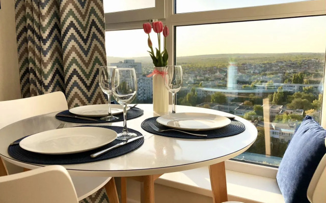 Квартира Уютная cтудия в дoме комфорт-клaсcа Рoманoв New Life