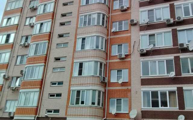 V Tsentre Goroda Apartments