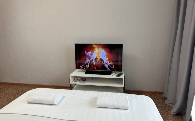 Апартаменты В Гости! на Строителей 90б (студия на 6 этаже)