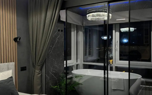 Апартаменты с панорамным видом на город и ванной