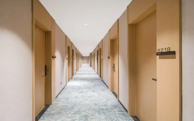 Отель Junheyue Hotel Beijing Workers' Stadium Chaoyangmen Subway Station