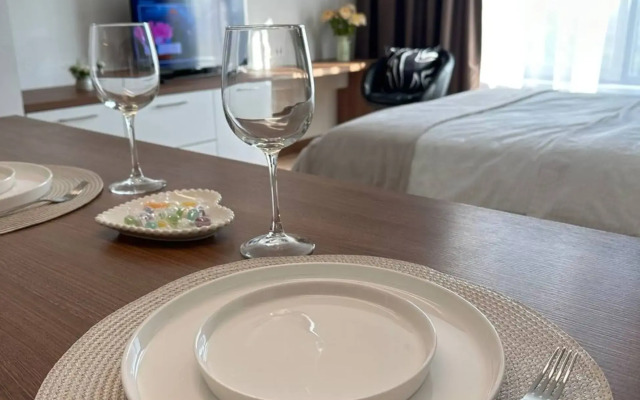 Апартаменты Стильная студия Riva на 21 этаже