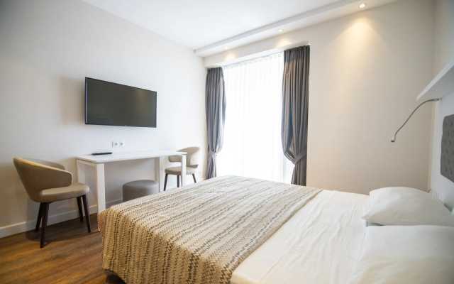 Apartamenty Bright Apartment with Balcony in Alliance Palace Batumi - Steps from the Sea & Dancing Fountains