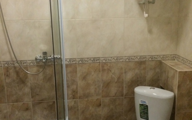 V Tsentre Goroda Apartments
