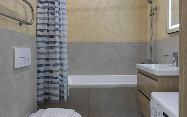 V Tsentre Goroda Apartments