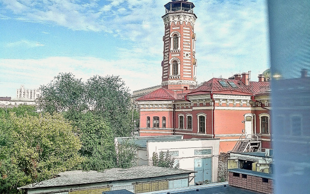 V Tsentre Goroda Apartments