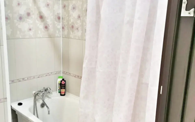 Квартира Уютная студия рядом с ТРЦ АУРА