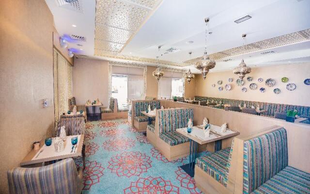 Отель Mena Plaza Hotel Albarsha