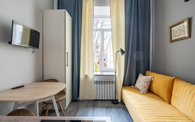 Апартаменты Уютная Двухуровневая Квартира Студия в Центре Города