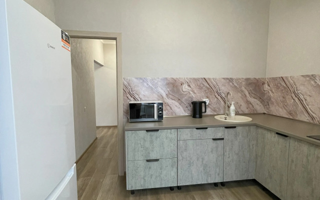 V Tsentre Goroda V 4-M Mikrorayone Flat