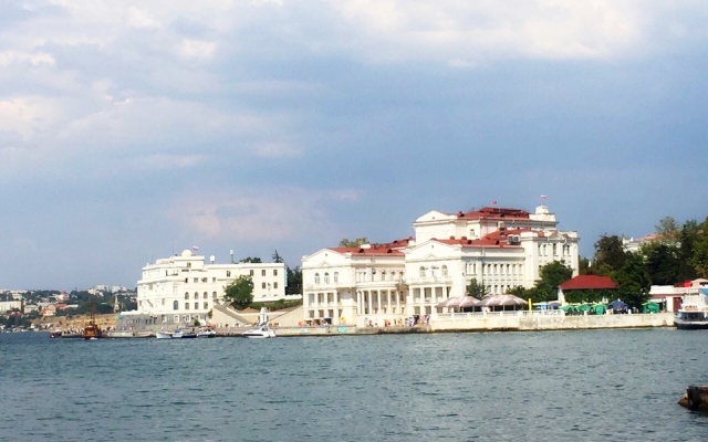 V Tsentre Goroda Apartments
