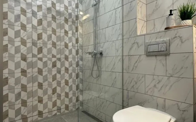 Odnokomnatnyie s Vidom na Gorod Dom Smile Apartments