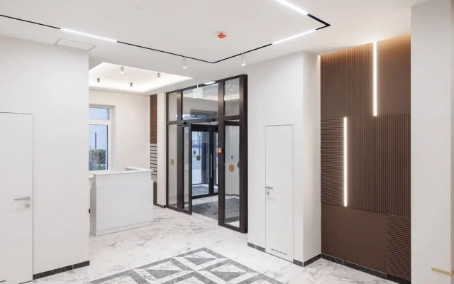 V Novom Dome Ostrovskogo 52 Flat