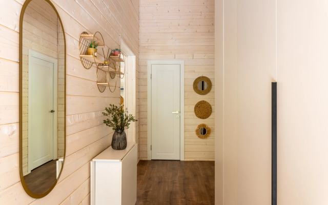 Частный дом в еловом лесу