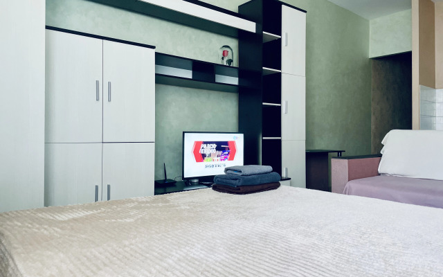 Квартира Уютная студия на Раздольной 1