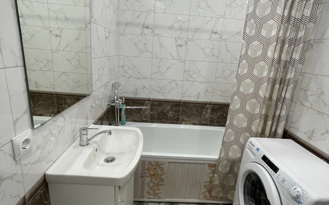 Апартаменты на Проспекте Строителей 27-4