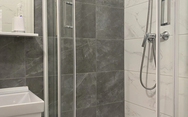 Квартира Новая уютная студия в престижном районе города