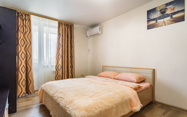 Уютные Апартаменты в доме у Космопорта (ул. Дыбенко 27а)