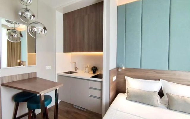 s Balkonom Apartments